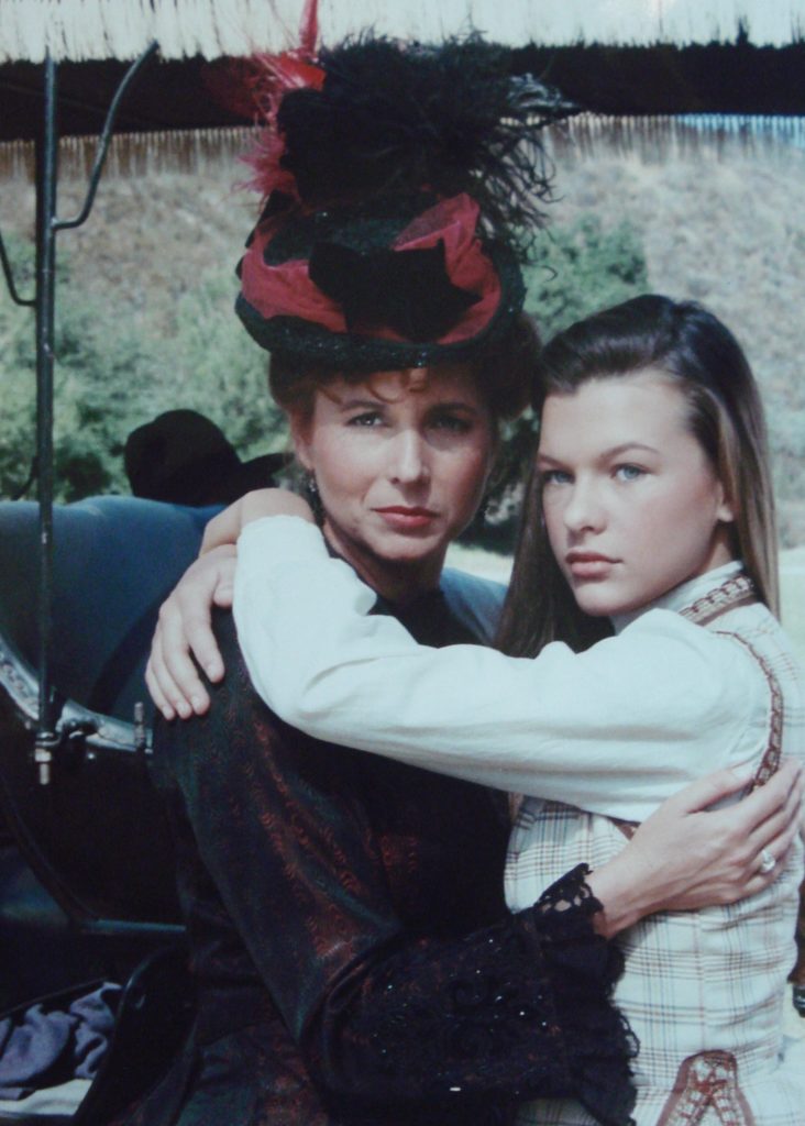 A Scene From an Old Film With Two Women Hugging