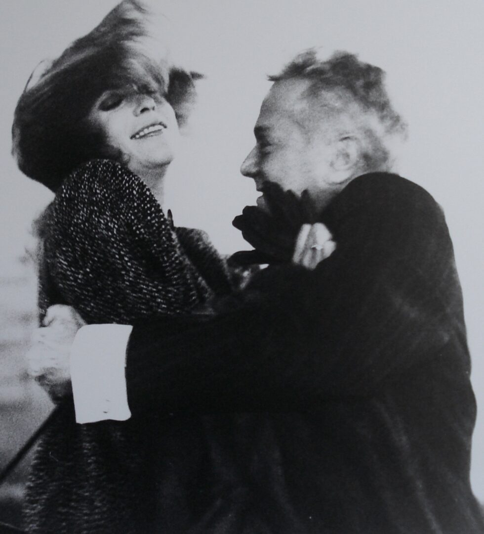 Black and White Picture of a Man and Woman Hugging